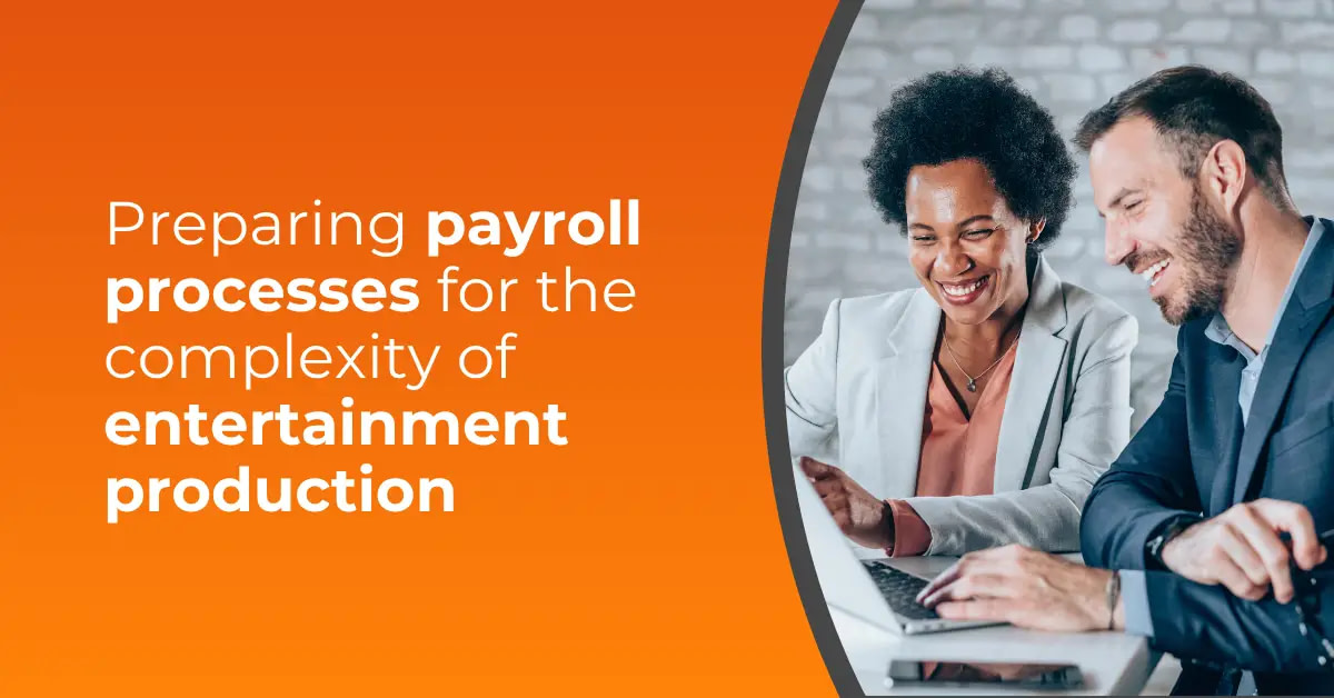 Producer reviewing documents with support from entertainment payroll companies