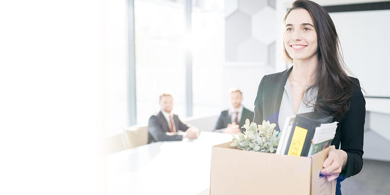 A Smiling Professional Moving On To New Opportunities