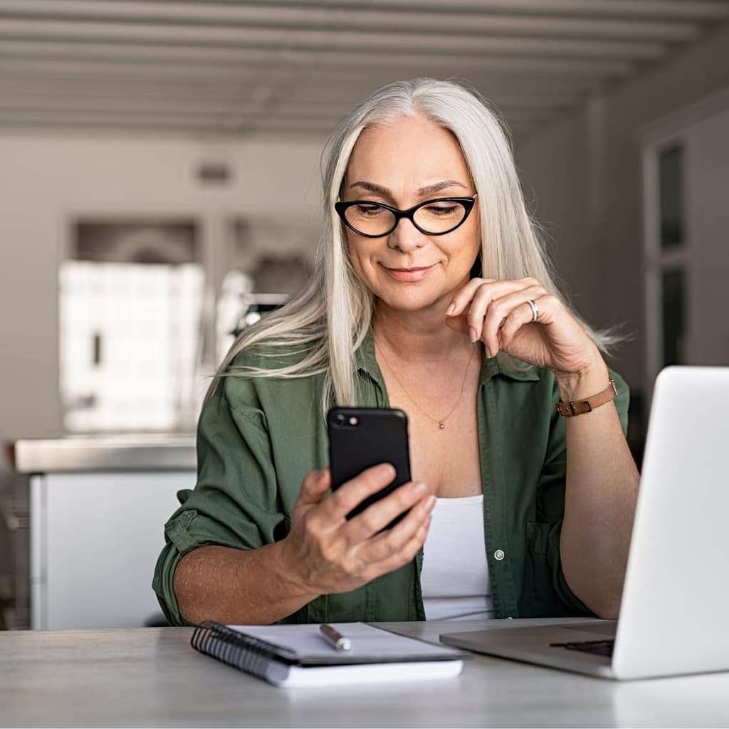 A woman looking her phone