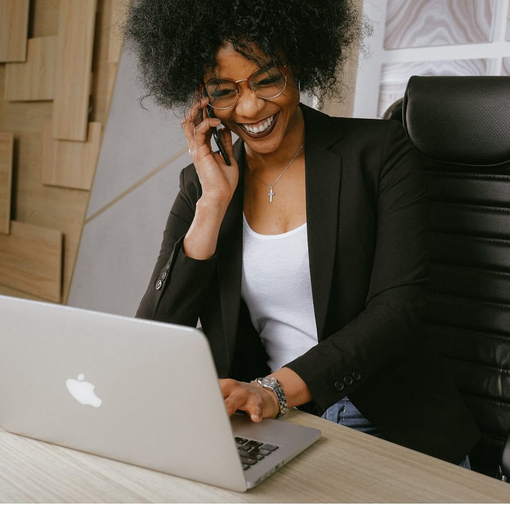 A woman working and talking on her phone