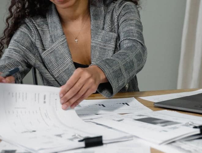 Woman checking documents