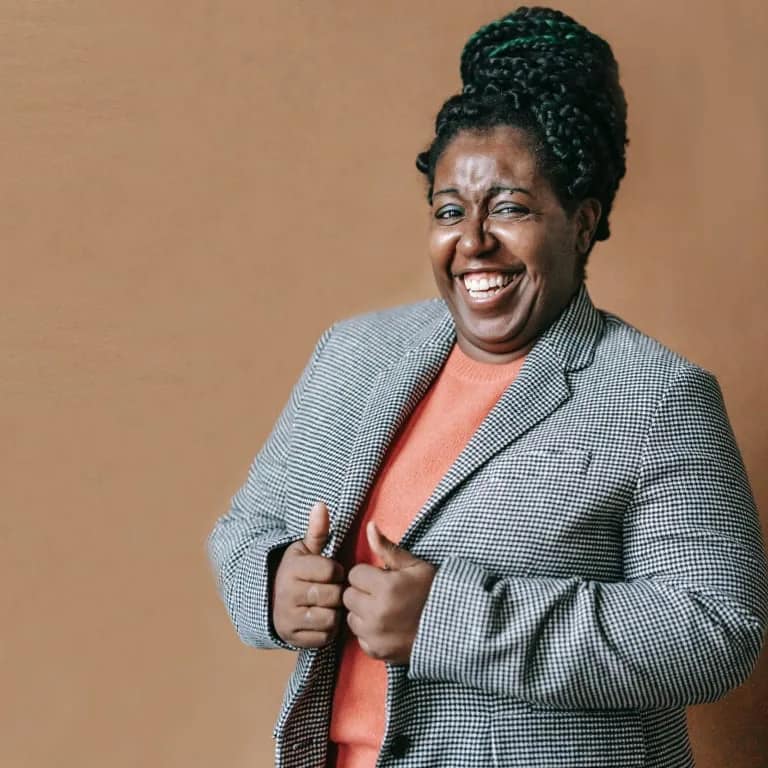 Woman with a suit laughing