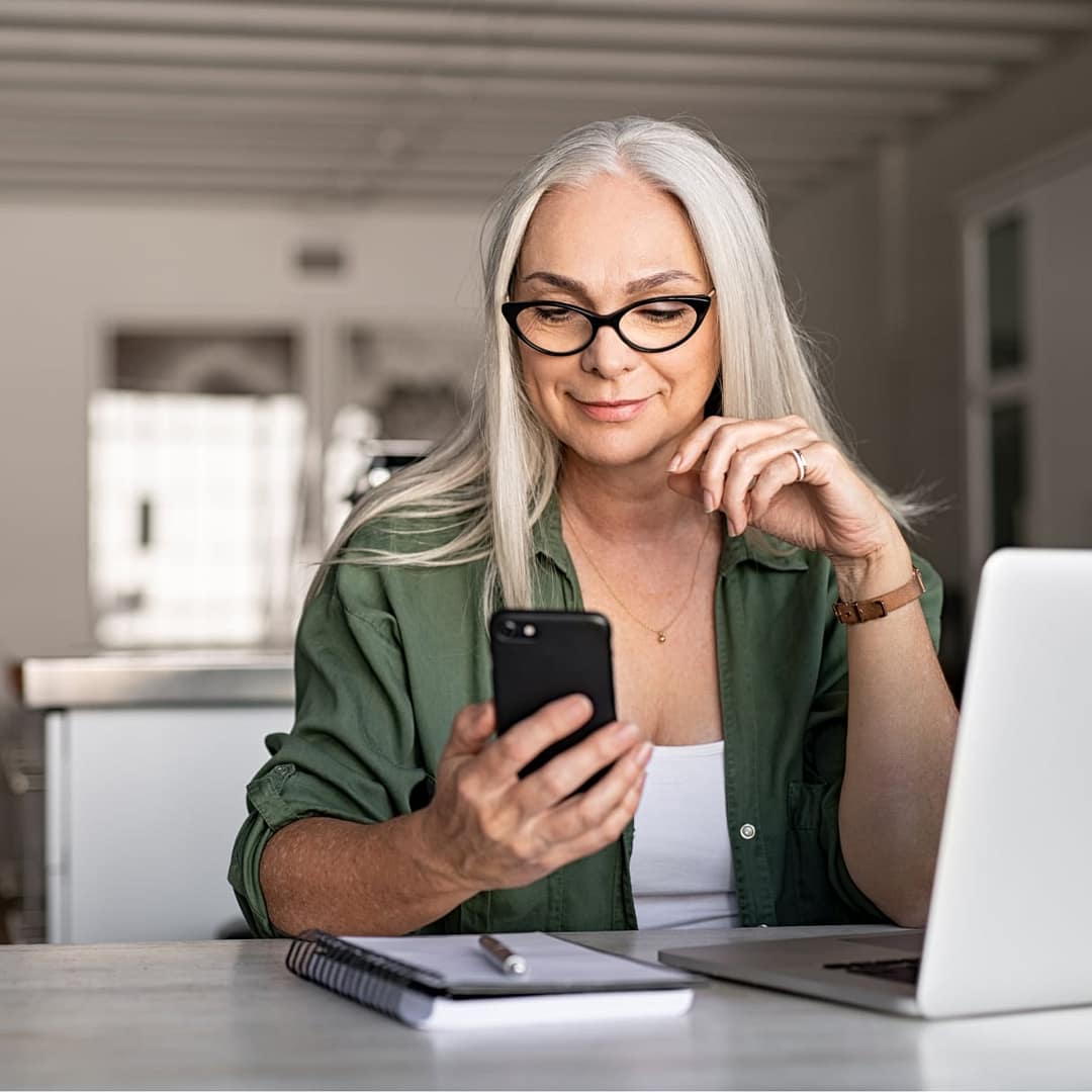 A woman looking her phone