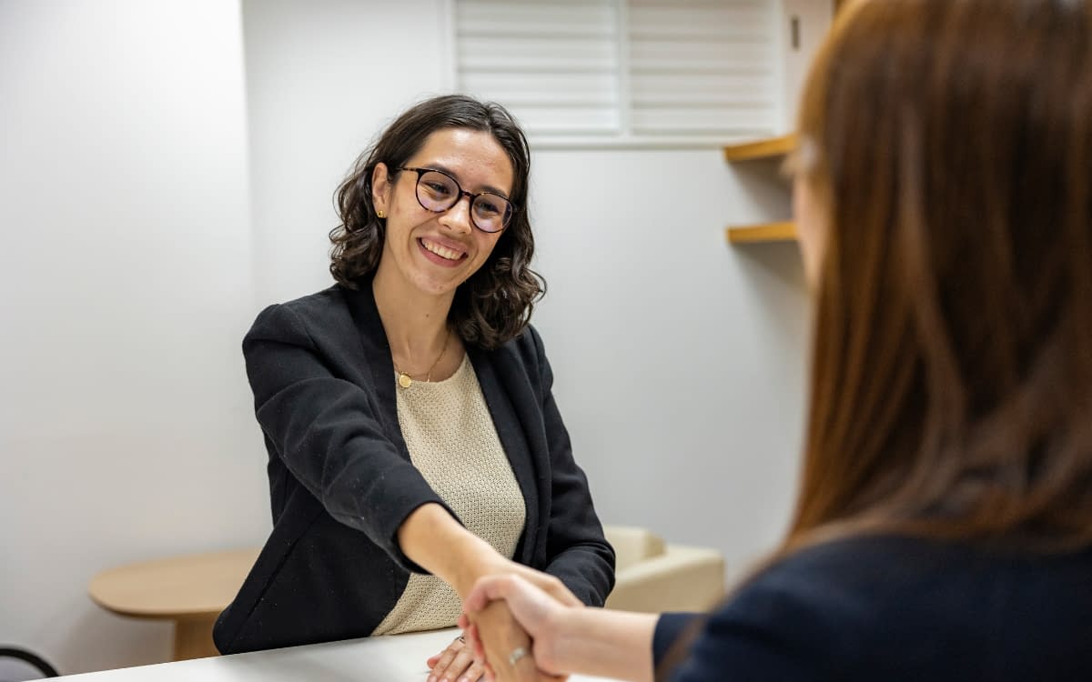 HR leader reviewing candidate screening results and time-to-fill metrics to improve quality of hire in a tight labor market